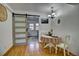 Dining area with rustic sliding doors and adjacent access to outdoor patio at 1517 S Owens St # 5, Denver, CO 80232
