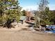 House exterior with a two-car garage and an inviting deck at 11540 Inspiration Rd, Golden, CO 80403