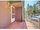 Close up of the front porch and address sign of house at 11540 Inspiration Rd, Golden, CO 80403