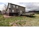 Backyard featuring a deck and lush grass at 3530 Doolittle Rd, Monument, CO 80132
