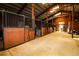 Barn interior with stalls at 3530 Doolittle Rd, Monument, CO 80132