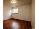Bright bedroom with hardwood floors and natural light from the window at 3530 Doolittle Rd, Monument, CO 80132