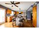 Spacious kitchen with a unique island, wood cabinets, and stainless steel appliances at 3530 Doolittle Rd, Monument, CO 80132