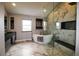 Luxury bathroom featuring modern fixtures, a soaking tub, and a glass shower at 3530 Doolittle Rd, Monument, CO 80132