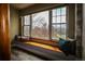 Comfortable window seat beneath a large window offering scenic outdoor views and natural light at 3530 Doolittle Rd, Monument, CO 80132