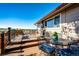 Relax on the outdoor deck with ample seating and neighborhood views at 9404 Devils Head Dr, Parker, CO 80138