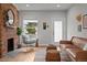 Inviting living space with fireplace, natural light, and modern furniture at 3003 California St, Denver, CO 80205