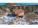 House with red roof and a yard, offering mountain views at 347 Buena Vista, Palmer Lake, CO 80133