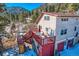 Two-story home with large deck and mountain views at 347 Buena Vista, Palmer Lake, CO 80133