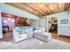 Cozy basement Gathering room featuring wood ceilings and comfortable seating at 347 Buena Vista, Palmer Lake, CO 80133