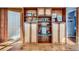 Spacious built-in shelving unit with ample storage at 347 Buena Vista, Palmer Lake, CO 80133