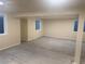 Basement space offering flexible layout options, ready for customization with a concrete floor and windows at 8491 W Star Cir, Littleton, CO 80128