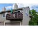 Charming home with an upper deck, complemented by the well-maintained siding and architectural details at 1470 S Quebec Way # 245, Denver, CO 80231