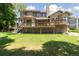 Expansive backyard view highlighting the large deck, well-maintained lawn, and attractive exterior details at 1123 Oakhurst Dr, Broomfield, CO 80020