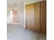 Spacious carpeted bedroom with large closet at 1123 Oakhurst Dr, Broomfield, CO 80020