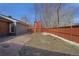 View of the large and private backyard with a wood fence at 5730 E 19Th Ave, Denver, CO 80220
