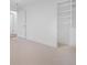 Bright bedroom featuring carpet floors and closet at 5730 E 19Th Ave, Denver, CO 80220
