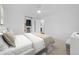 Bright, minimalist bedroom featuring a closet, neutral tones, and a cozy atmosphere at 5730 E 19Th Ave, Denver, CO 80220