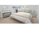 Inviting bedroom with a comfortable bed, stylish vanity, and natural light creating a serene space at 5730 E 19Th Ave, Denver, CO 80220