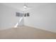 Empty bedroom with wall-to-wall carpet and abundant natural light at 5730 E 19Th Ave, Denver, CO 80220