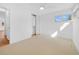 Clean, empty bedroom with closet, carpeting and good natural light at 5730 E 19Th Ave, Denver, CO 80220