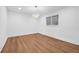 Minimalist dining area with overhead lighting and hardwood floors. Great natural light at 5730 E 19Th Ave, Denver, CO 80220