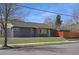 Charming painted brick home has manicured lawn and privacy fencing at 5730 E 19Th Ave, Denver, CO 80220