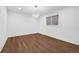 Bright living room featuring hardwood flooring and recessed lighting at 5730 E 19Th Ave, Denver, CO 80220