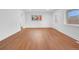 Wide open living room showing beautiful hardwood floors and a bright, airy atmosphere at 5730 E 19Th Ave, Denver, CO 80220