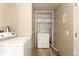 Laundry room with washer and dryer included. Stackable and space saving at 1624 Yarrow St, Lakewood, CO 80214