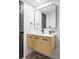 Modern bathroom featuring light wood vanity, floating cabinet, and clean contemporary design at 4269 Carter Trl, Boulder, CO 80301