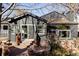 Back exterior view of home featuring a sliding glass door leading to the back patio and yard at 4269 Carter Trl, Boulder, CO 80301