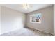 Carpeted bedroom with a ceiling fan and natural light from window at 3387 S Pitkin Way, Aurora, CO 80013