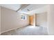 Bedroom featuring neutral carpet and natural light from a window at 3387 S Pitkin Way, Aurora, CO 80013