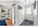 Bright entryway featuring slate floors, coat hooks, and easy access to living spaces at 3209 Redstone Rd # 12B, Boulder, CO 80305