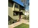 Exterior view of home showcasing front door, walkway, and landscaped garden with flowers at 3209 Redstone Rd # 12B, Boulder, CO 80305