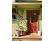 Charming front entrance with a red door, planters, and clearly marked house number at 3209 Redstone Rd # 12B, Boulder, CO 80305
