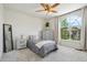 Comfortable bedroom with neutral decor, ample natural light, and carpeting at 4520 Maroon Cir, Broomfield, CO 80023