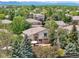 Beautiful home featuring a stone facade and a private patio for outdoor relaxation and entertaining at 4520 Maroon Cir, Broomfield, CO 80023