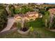 Expansive property boasts mature trees, sprawling lawn, and stunning home with outdoor patio at 3502 Birch Ave, Parker, CO 80134