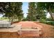 Spacious backyard area with lush greenery and hardscape, perfect for outdoor activities and relaxation at 3502 Birch Ave, Parker, CO 80134
