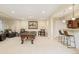 Basement featuring a pool table, bar with seating, and lounge area at 3502 Birch Ave, Parker, CO 80134