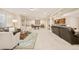 Spacious basement with seating area, wet bar, and pool table for entertaining at 3502 Birch Ave, Parker, CO 80134