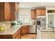 Kitchen showcasing stainless steel appliances, granite countertops and custom wood cabinetry at 3502 Birch Ave, Parker, CO 80134