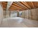 Unfinished basement featuring concrete floors and exposed ceiling at 5531 Fox Meadow Ave, Highlands Ranch, CO 80130