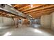 Unfinished basement featuring concrete floors and exposed ceiling at 5531 Fox Meadow Ave, Highlands Ranch, CO 80130