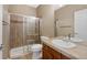 Bathroom with a glass-enclosed shower, vanity, and a neutral color palette at 5531 Fox Meadow Ave, Highlands Ranch, CO 80130