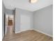Simple bedroom with hardwood floors and closet, providing a blank canvas for personalization at 5531 Fox Meadow Ave, Highlands Ranch, CO 80130