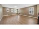 Bedroom featuring hardwood floors, neutral walls, and lots of natural light at 5531 Fox Meadow Ave, Highlands Ranch, CO 80130