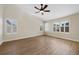 Bedroom featuring natural light, vaulted ceilings, a fan and neutral walls, creating a cozy retreat at 5531 Fox Meadow Ave, Highlands Ranch, CO 80130